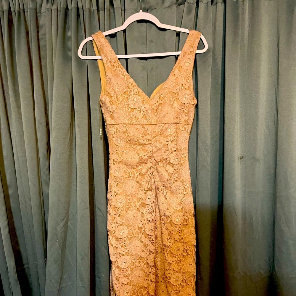 Tan prom or homecoming dress  is a emerald sundae dress long no sleeves